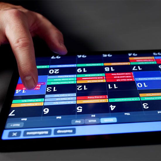 Checking calendar on tablet